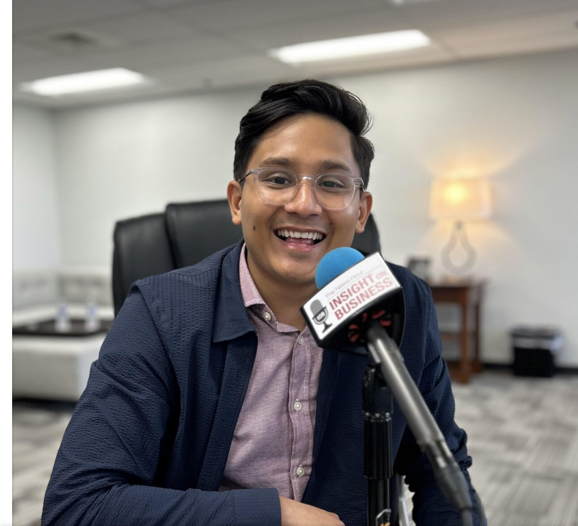 Sam sharing his story on the local podcast, Insights on Business