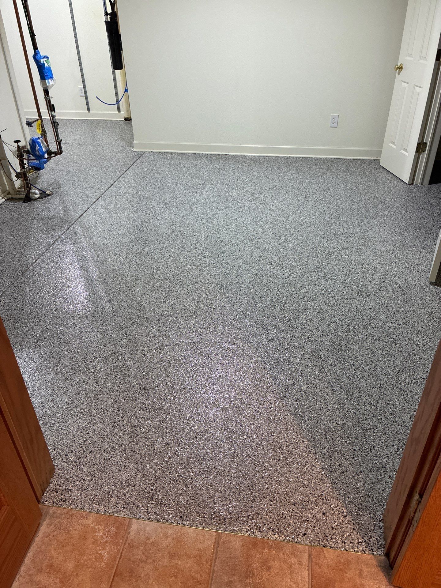 Coated basement floor
