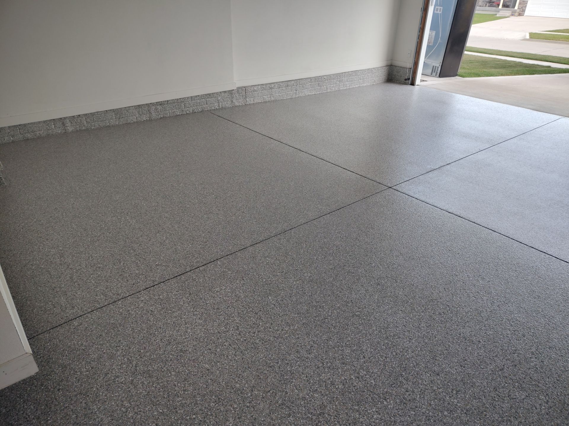 Coated garage floor by Revival
