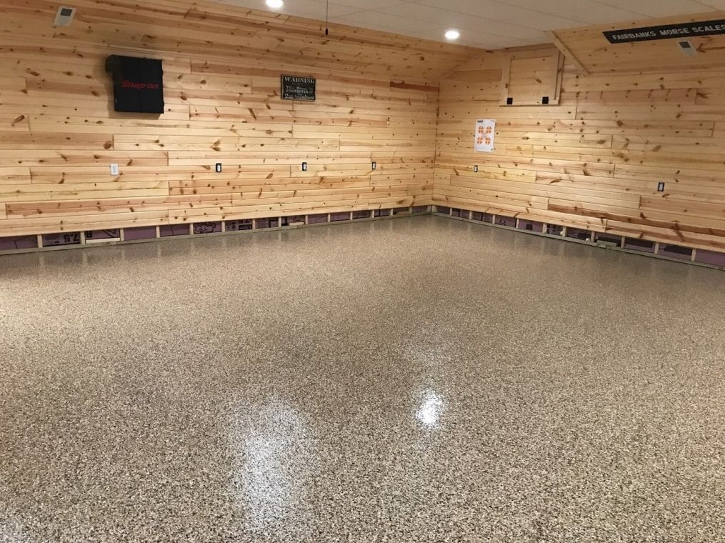 Modern basement with flake flooring.