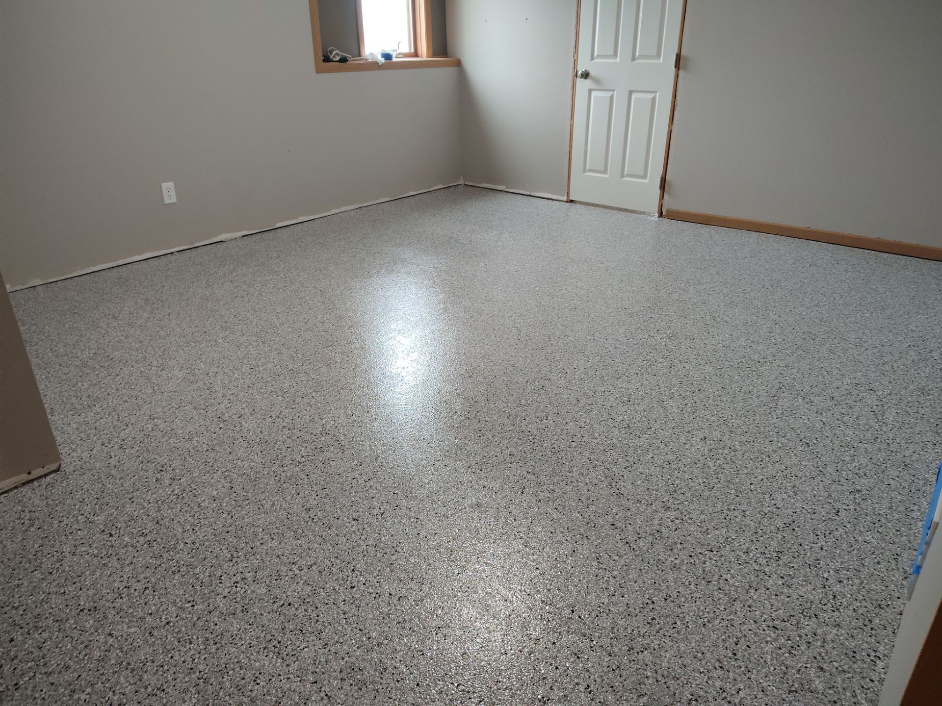 Coated basement floor